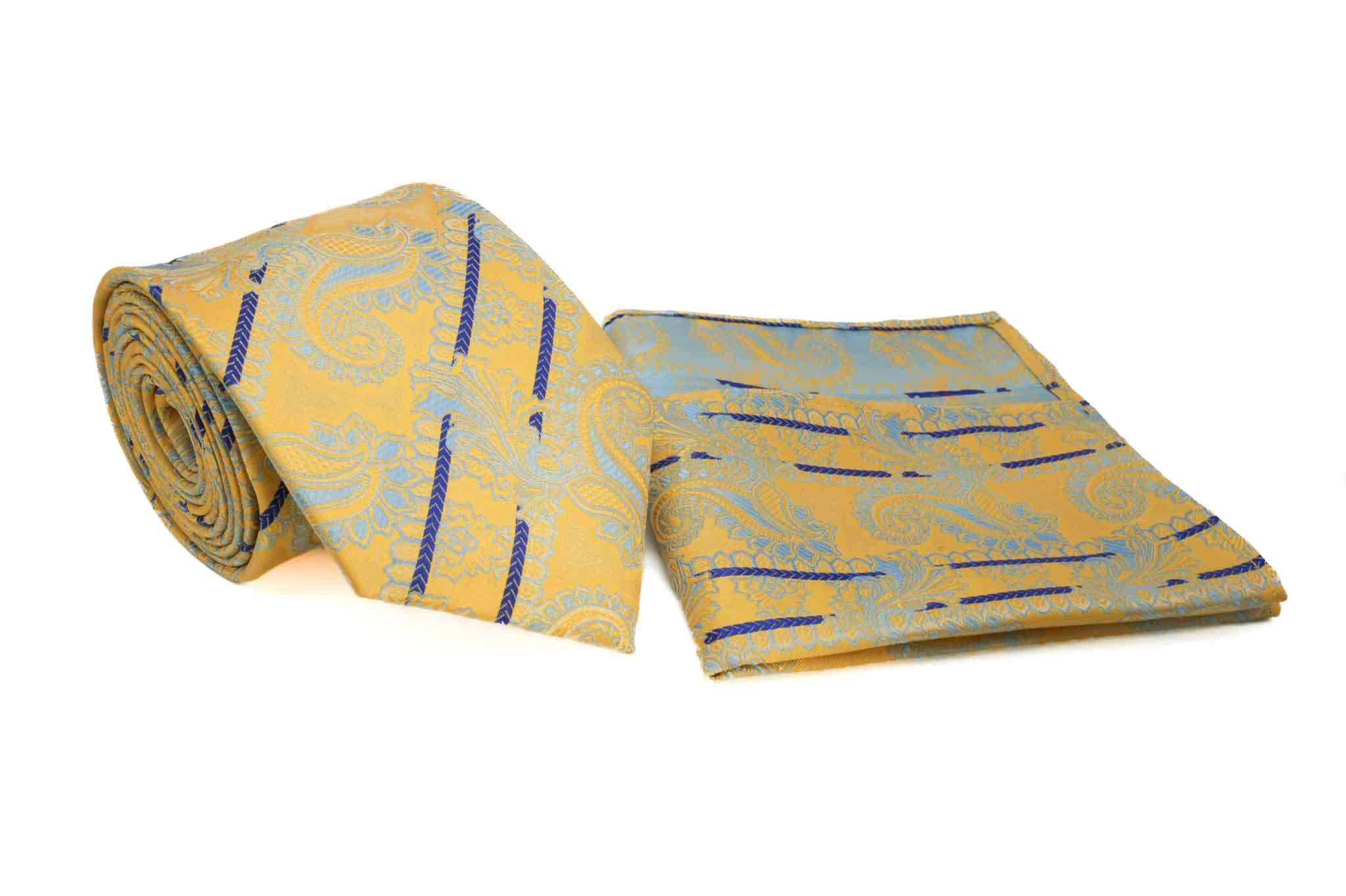 "Conjunto de corbata y bolsillo con motivos paisley azul y amarillo, elegante y vibrante."